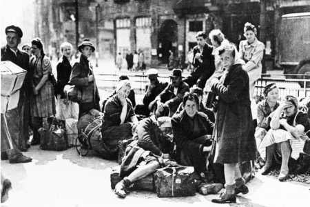 Refugees wait for transport, Berlin, June 1945.